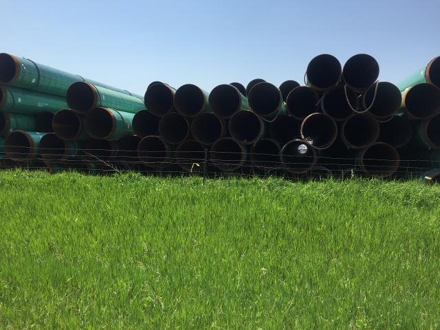 Dakota Access left pipes piled up in Newton that will be used to create  the Bakken Oil Pipeline
