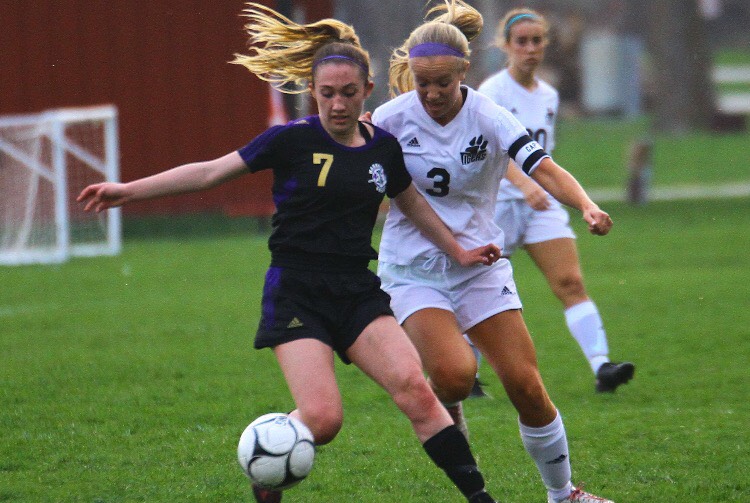 Number three, Allie Cook, challenges opposing team. The Tigers we able to posses the ball well enough to continue their winning streak. 