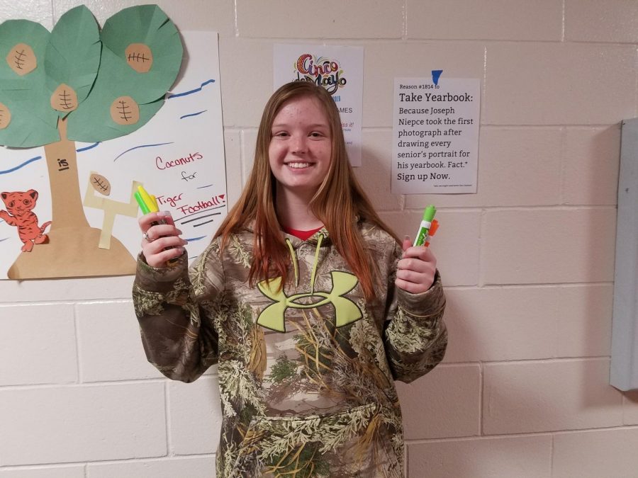 May Fine Arts Student of the Month Tanna Carmichael wields her markers, ready to take on any artistic challenge that comes her way
