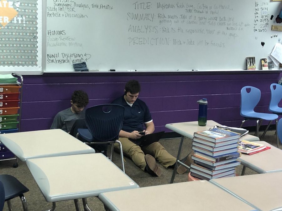 Kaden Sutton works hard in class, mentally preparing for his meet tonight. He said, ¨It teaches you be tough and work hard.¨