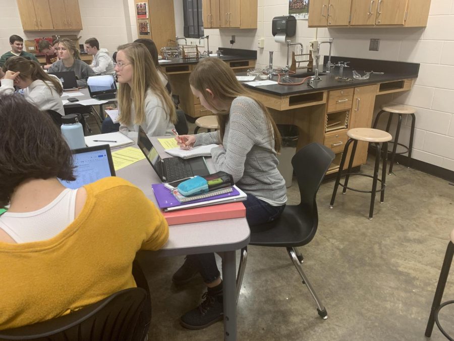 Hard at work, Amber Gehring is attending one of her many difficult classes: Physics. She is able to handle such classes with good study habits. Amber advices others to find a balance between school work and fun activities.