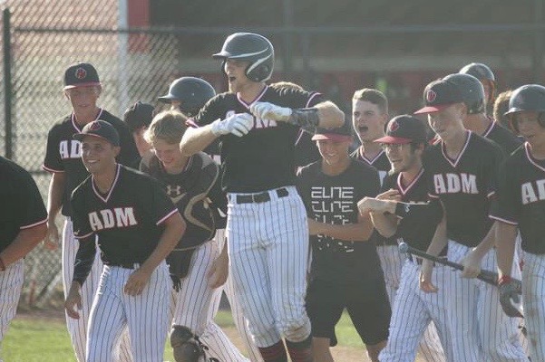ADMs+high+school+baseball+team+celebrates+as+they+upset+Harlan+in+the+District+Finals%2C+sending+them+to+the+state+tournament+with+a+record+of+13-17.