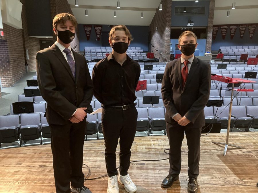 Brennan McGee, Cash Riker, and Sean Whitson, the three All-State choir musicians all posed in their suits after they finished their auditions. Days later, they learned that they all were accepted to the choir.