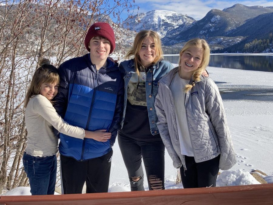 My sisters and I stand in front of the lake in Grand Lake, Colorado, the day before 2021. 