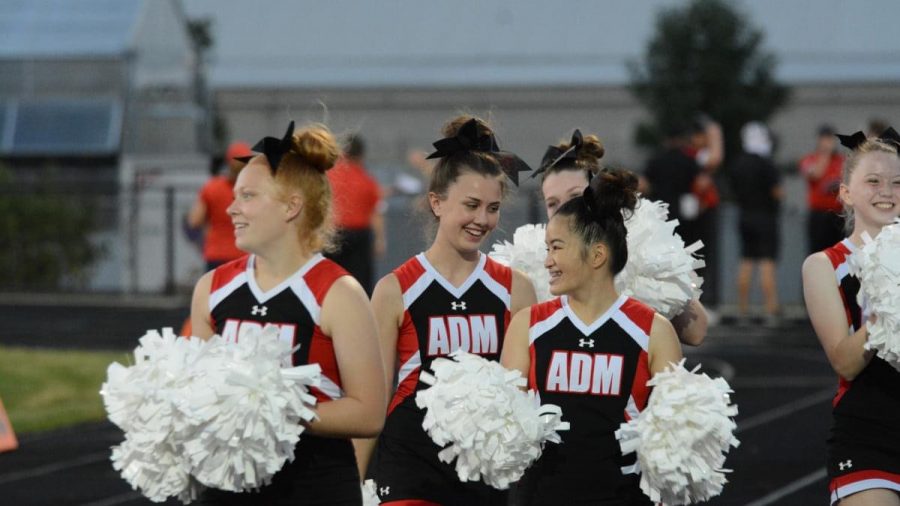 Pictured on the left, Avery Miller and the rest of her team get ready to cheer on ADM. 