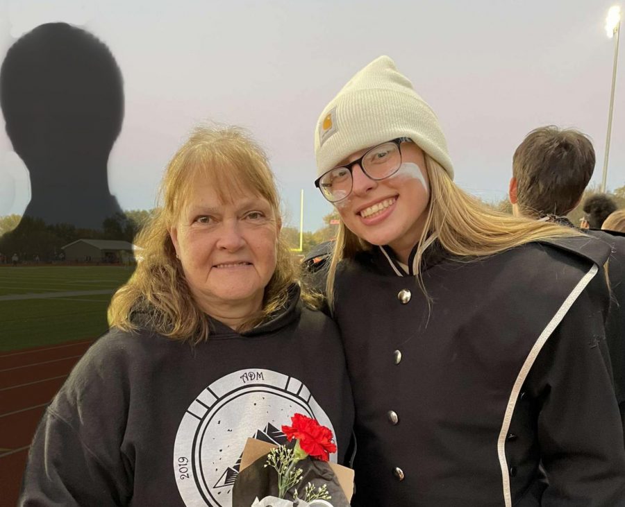 Photo illustration by Chris Aukes. Shaelyn Wiederien and her mother, Mary Wiederien pose for a picture at ADMs Senior Night held fall of 2021.