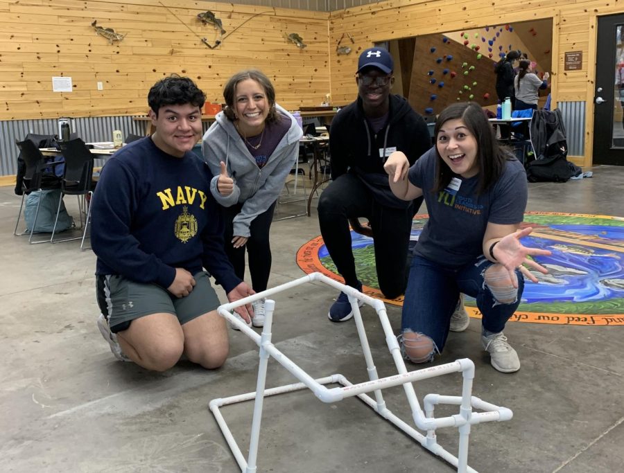 Leadership and team building exercise at Jest Park for Youth Leadership Initiative. Pictured: three students and one adult mentor.