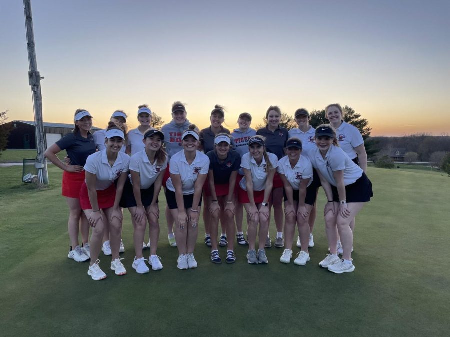 ADM Tigers Girls Golf posing for a photo after winning against Woodward Granger.