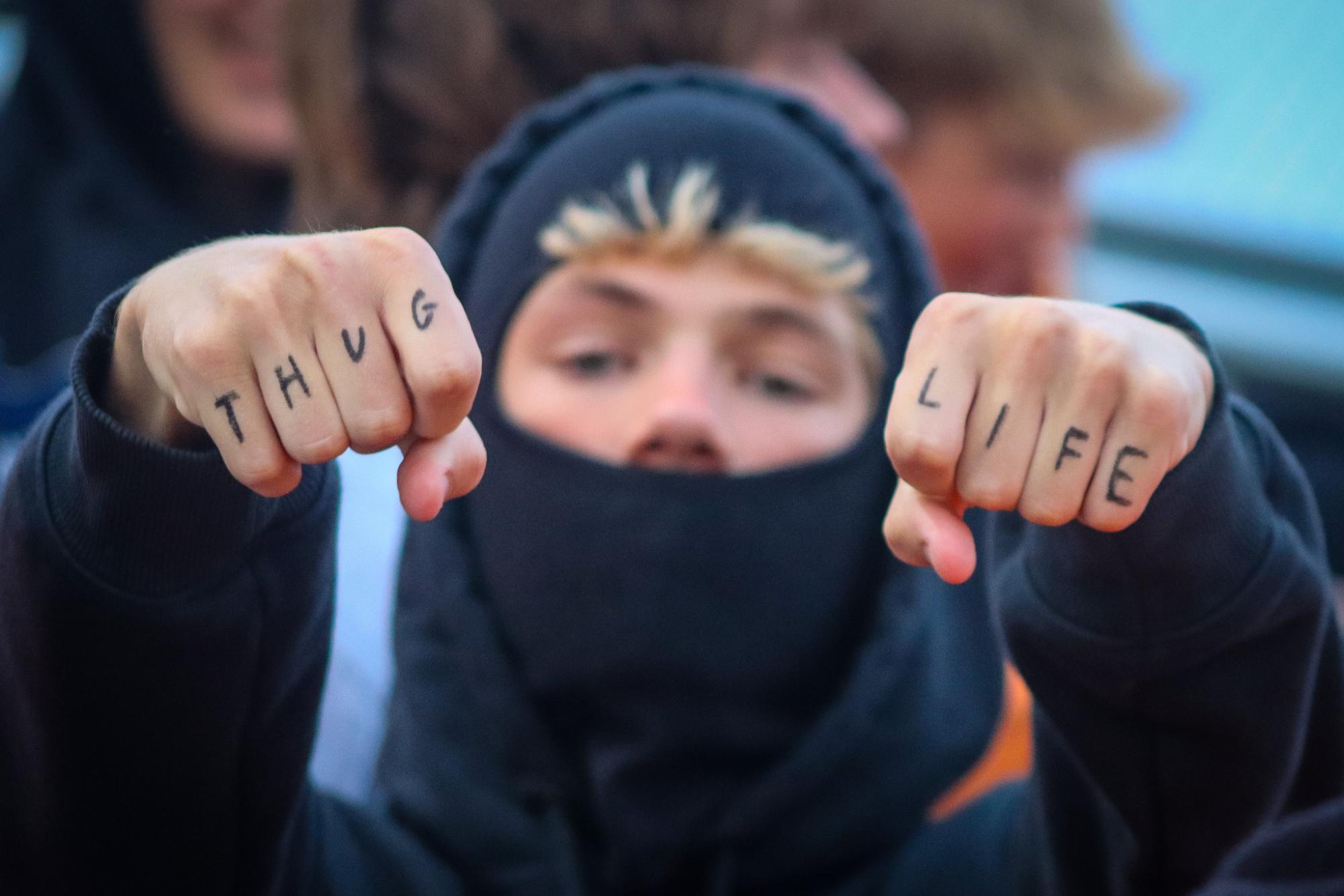 Staying true to his prisoner persona, sophomore Grayson Sutter showed off his tatted accessories. 