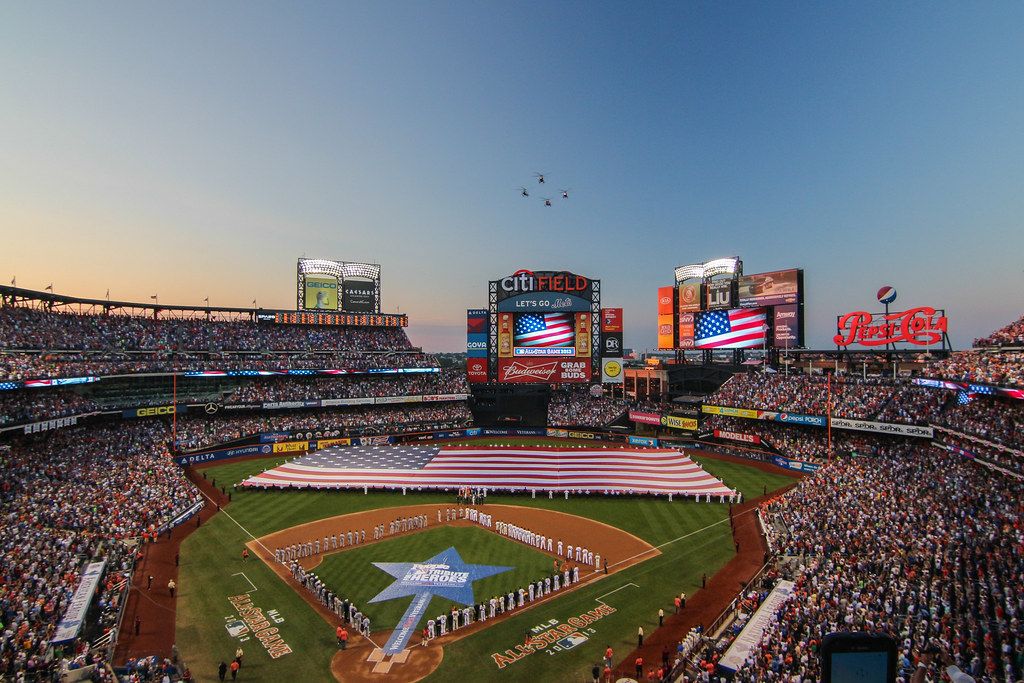 Players and fans rise during the National Anthem at the 2013 MLB All Star Game.