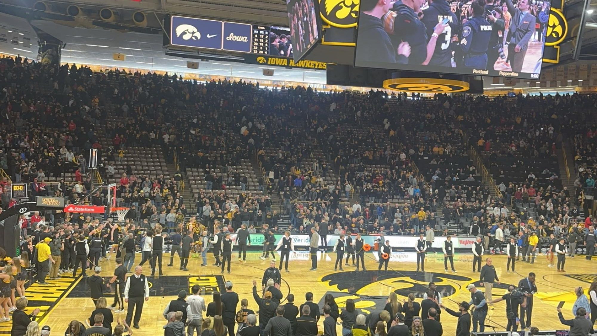 The Iowa Mens basketball team celebrates after knocking off Wisconsin in overtime 88-86 at Carver Hawkeye Arena on February 17, 2024. Adam Bryte said that he expects Iowa to be able to compete because they will be able to shoot really well next year.