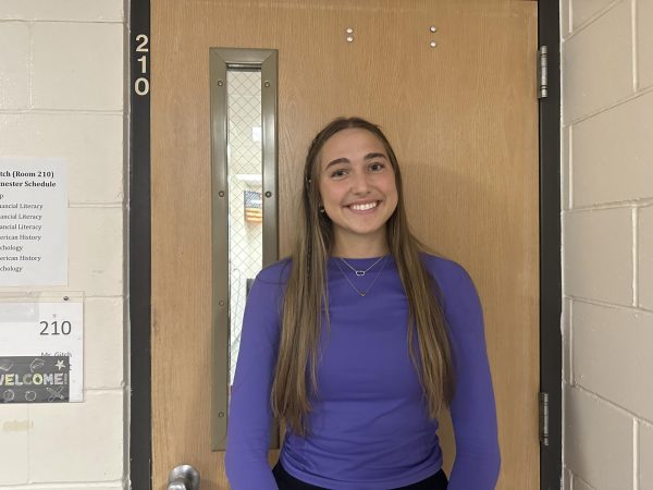 Senior Marissa Gerleman smiles for a photo after she discovers she is the Athlete of the Month. 