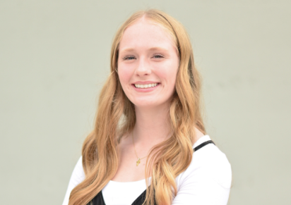 Book poses in a business like manner for her senior photos. Book says, "It is important to dress and act in a professional manner because you never know who is around you, you wanna make a good impression." WBL has offered Book many ways to gain experience and professionalism. 