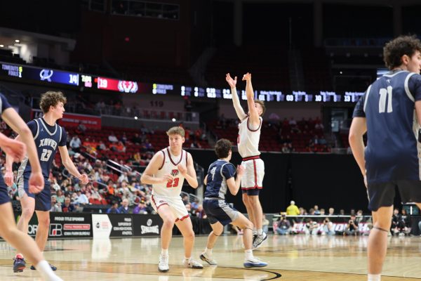Hudson Lorensen gets some height as he brings in another free throw for ADM.