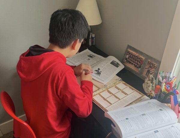 Freshman Harris Rychnovsky works on school work. The Rychnovsky family, especially their three boys, are involved in many things throughout the Adel community. Harris Rychnovsky, and junior Owen Rychnovsky compete in sports representing ADM, while going a different track for their academics.  Classical Academy is a Biblically led educational program held in Adel, Iowa that the youngest Rychnovsky boys attend. The oldest, Grant, is a sophomore at Northwestern College. 