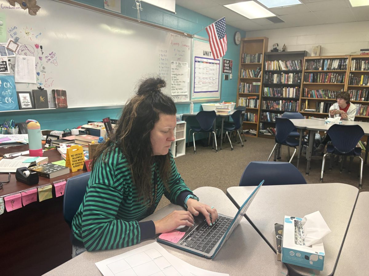 The other Teacher of the Month this May is Beth Knipper. She was nominated by Caroline Book because she has a safe space in Knipper's room, and Knipper is always willing to help her. Knipper has taught for 20 years total, 16 of which have been at ADM. She chose to teach because she needed to get out of journalism for her mental health, and English felt like the logical switch. Because Teacher of the Month is picked by students, it feels more valid to Knipper, and it shows her she's doing the right things in her role.  